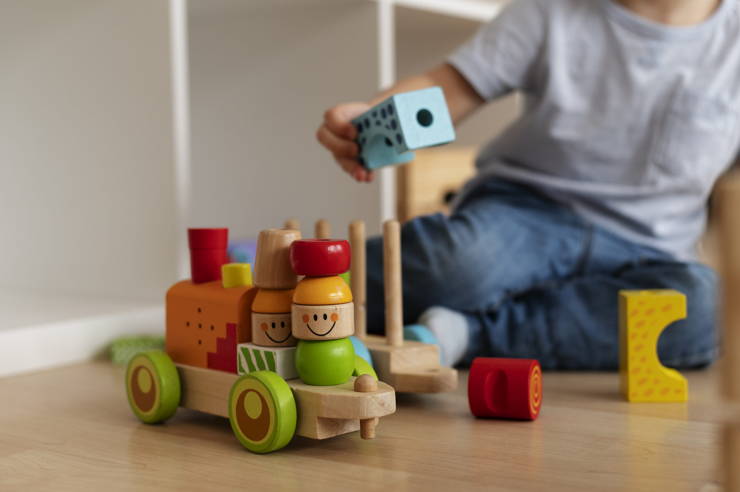 Houten speelgoed ontwikkeling kinderen